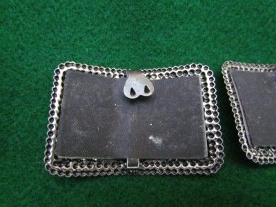 Excellent condition Textured silver tone metal w/ black faux leather 