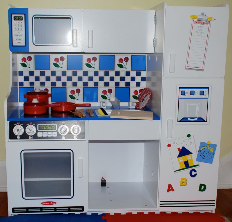 The deluxe kitchen set is solid and has lots of activities.